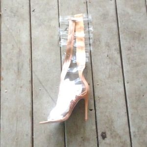 Cream 8.5 it go all the way up your leg and the straps of see through at the top